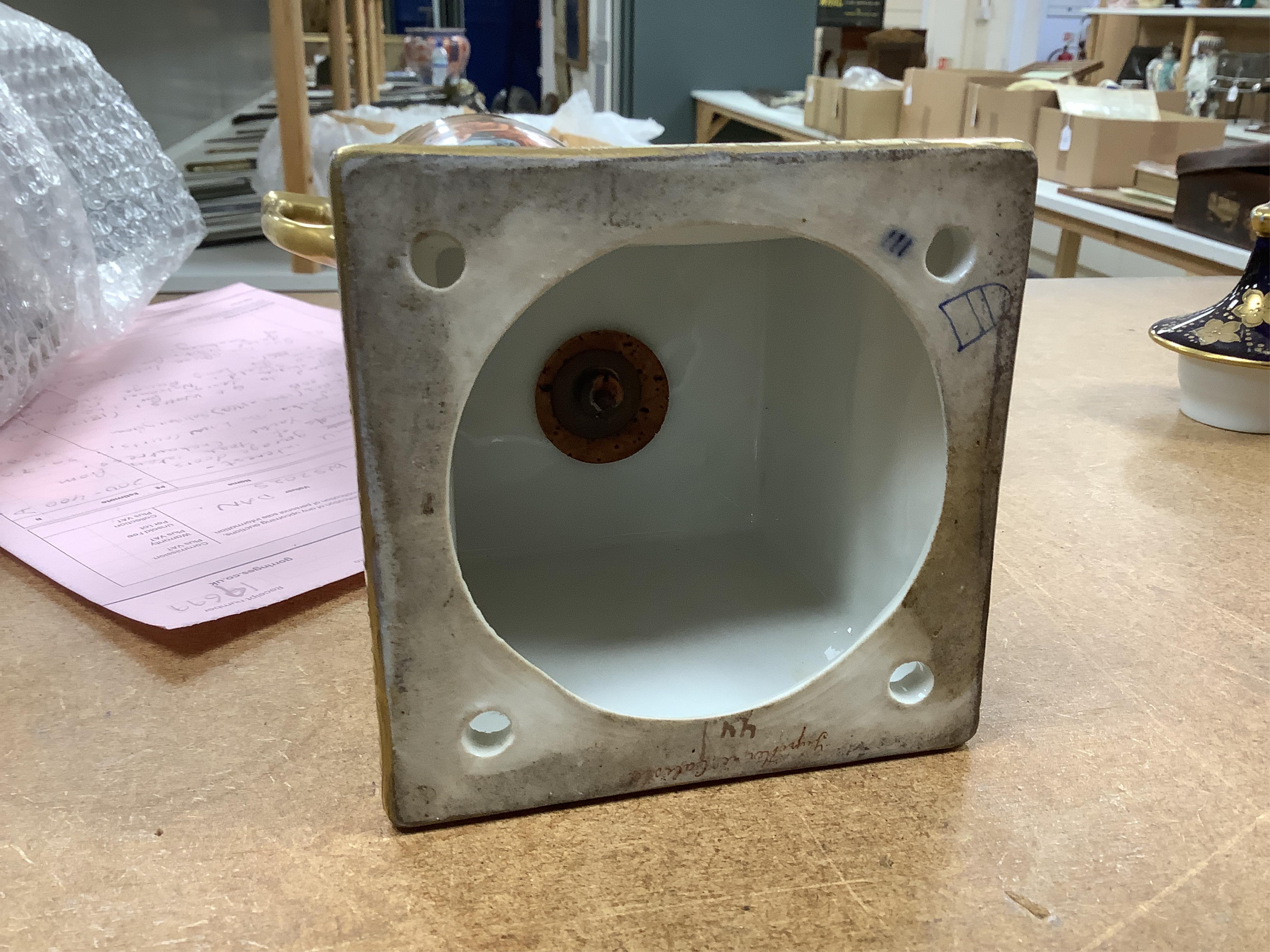 A pair of early 20th century Vienna style porcelain urns and covers, 36cm